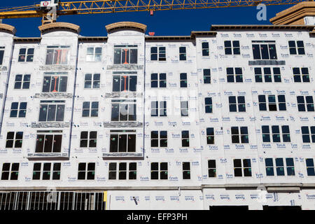 DuPont Tyvek house wrap applied on new condominium home construction - Virginia USA Stock Photo