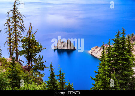 Looking down on Crater Lake and the island called the Phantom Ship. Crater Lake National Park, Oregon, United States. Stock Photo