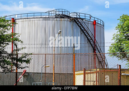 Industrial gas storage tank next to the power station Stock Photo