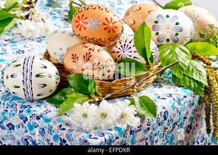 Easter eggs with blossom on the table Stock Photo