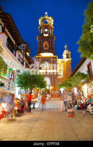 View of Parroquia de Guadalupe (Church of Our Lady of Guadalupe) at dusk, Downtown, Puerto Vallarta, Jalisco, Mexico Stock Photo