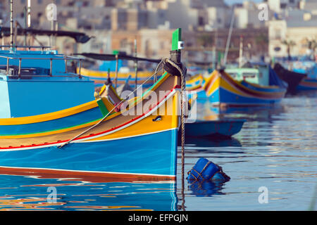 Colourful fishing boats (dghajsa), Marsaxlokk Harbour, Malta, Mediterranean, Europe Stock Photo