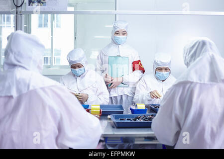 Workers in ecigarette factory Stock Photo