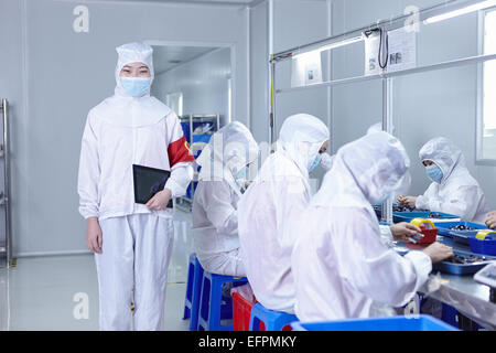 Workers in ecigarette factory Stock Photo