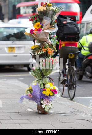 Floral tributes left at the scene of a fatal cyclist accident in central London Stock Photo
