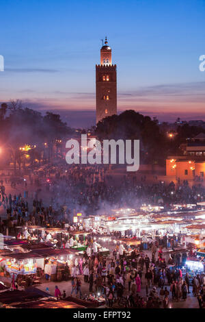 Crowded market at sunset, Djemaa el-Fnaa Square, Marakech, Morocco Stock Photo