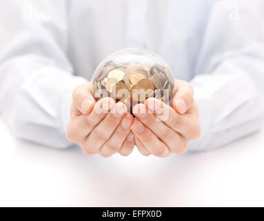 Crystal ball with money in hands Stock Photo