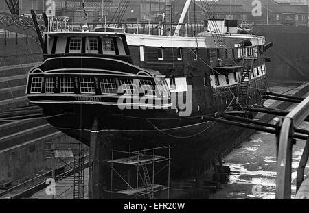 AJAXNETPHOTO. - 16TH FEBRUARY, 1972. SOUTHAMPTON, ENGLAND. - WOODEN WALL REFIT -  T.S. FOUDROYANT (EX TRINCOMALEE) UNDERGOING REPAIRS IN NR. 5 DRY DOCK.  PHOTO:JONATHAN EASTLAND/AJAX REF:357207 8 1 Stock Photo