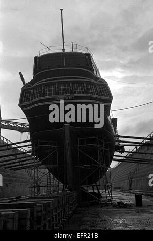 AJAXNETPHOTO. - 16TH FEBRUARY, 1972. SOUTHAMPTON, ENGLAND. - WOODEN WALL REFIT -  T.S. FOUDROYANT (EX TRINCOMALEE) UNDERGOING REPAIRS IN NR. 5 DRY DOCK.  PHOTO:JONATHAN EASTLAND/AJAX REF:357207 10 1 Stock Photo