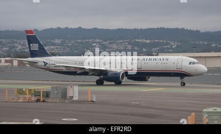 A US Airways Airbus A319/A320 aircraft rests on the tarmac at San Francisco International airport in San Francisco, California, awaiting its turn to take-off on Thursday, February 5, 2015. Credit: Ron Sachs / CNP / dpa - NO WIRE SERVICE - Stock Photo