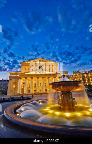 The fountain in front of the Bolshoi Theatre building illuminated at night. Moscow, Russia. Stock Photo