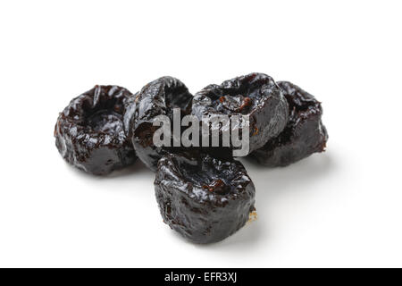 Sweet prunes isolated on white Stock Photo