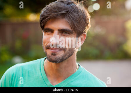 Portrait of man looking into distance Stock Photo