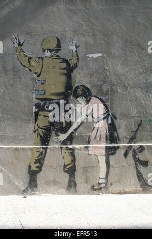 Banky's iconic image of a girl searching a soldier, Bethlehem Stock Photo