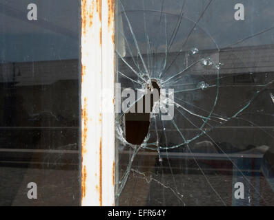 shattered and broken glass of a window Stock Photo