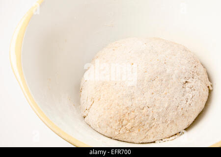 Wholemeal Bread Dough Proving in a Mixing Bowl Stock Photo