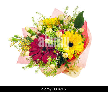 Beautiful bouquet of gerbera, carnations and other flowers in red  package isolated on white background. Stock Photo