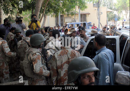 Abdul Rafiq Rangers Rangers staffs escorting accused Abdul Rafiq, the key suspect behind ...