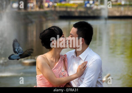 Horizontal portrait of a newly married couple in Thailand. Stock Photo