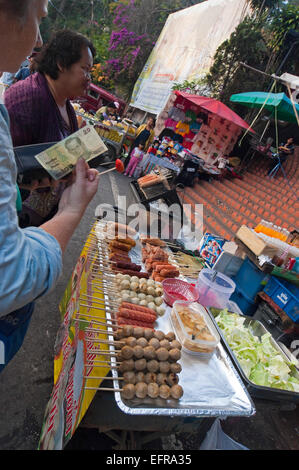 Vertical close up of a fastfood stall on the roadside in Thailand. Stock Photo