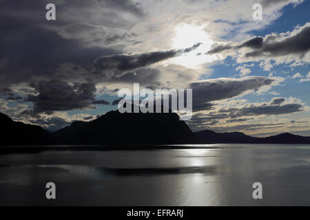 Dramatic sunset over Geirangerfjord, UNESCO World Heritage Site, Sunnmøre region, Møre og Romsdal county, Western Norway, Scandi Stock Photo