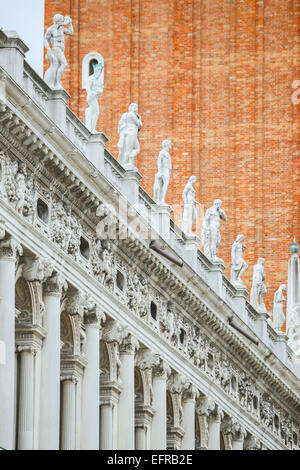 Statues on the exterior of the National Library of Saint Mark in Venice, Italy.