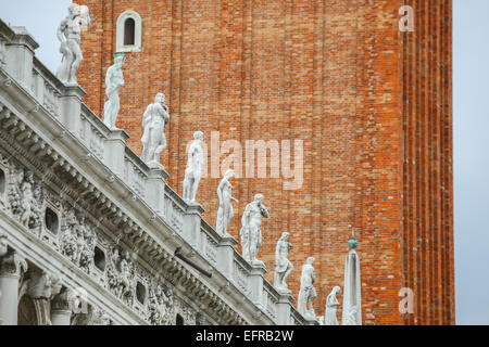 Statues on the exterior of the National Library of Saint Mark in Venice, Italy.
