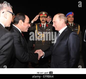 Cairo, Egypt. 9th February, 2015. Russian President Vladimir Putin arrives in Cairo for a 2-day visit, greeted by Egypt's Sissi. Credit:  Barry Iverson/Alamy Live News Stock Photo