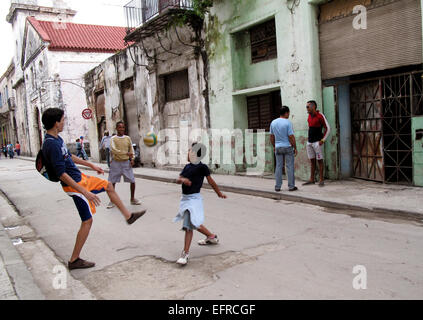 Kids playing in street, Cuba Stock Photo