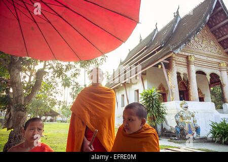 Young buddhist monks, Luang Prabang, Laos. Stock Photo