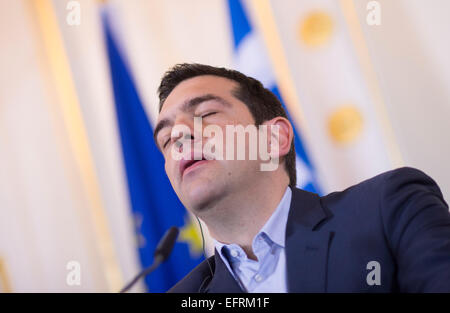 Vienna, Austria. 9th Feb, 2015. Greek Prime Minister Alexis Tsipras listens during a news conference in Vienna, Austria on February 09, 2015. Credit:  Christian Bruna/ZUMA Wire/ZUMAPRESS.com/Alamy Live News Stock Photo