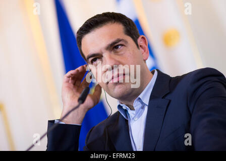 Vienna, Austria. 9th Feb, 2015. Greek Prime Minister Alexis Tsipras listens during a news conference in Vienna, Austria on February 09, 2015. Credit:  Christian Bruna/ZUMA Wire/ZUMAPRESS.com/Alamy Live News Stock Photo