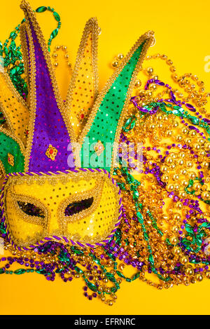 Download Mardi Gras Mask On A Yellow Background Stock Photo Alamy Yellowimages Mockups