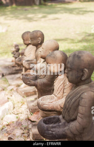 Little monk clay doll decorated in garden, stock photo Stock Photo