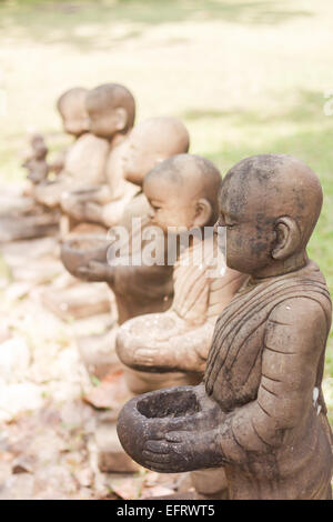 Little monk clay doll decorated in garden, stock photo Stock Photo