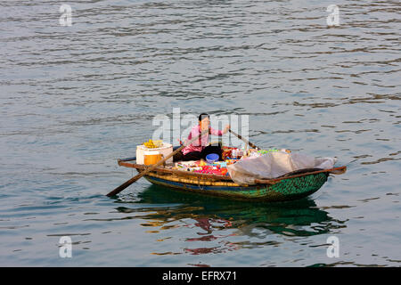 Snack food boat vendor Halong Bay Vietnam Stock Photo