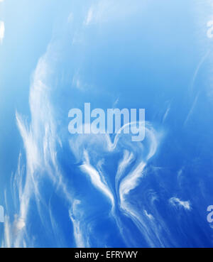 Heart shaped cloud on blue sunny sky. Love, Valentine's Day concepts Stock Photo