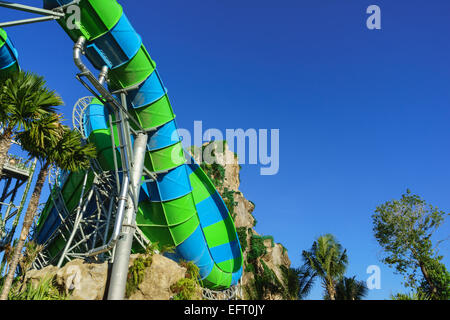 Huge Jungle Water Tube Slides in water theme park look exiting and are perfect attractions for both young and adults in holidays Stock Photo