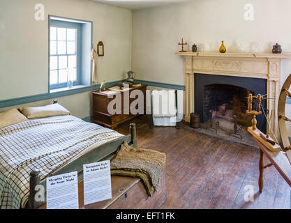 Bedroom in the historic 18thC Old Stone House, M Street NW, Georgetown, Washington DC, USA Stock Photo