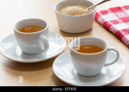 Small cups of 'redbush espresso' - a caffeine free alternative to espresso coffee. Stock Photo