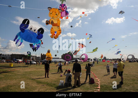 Kites of all shapes and sizes flying over the seafront at Southsea, Hants at the annual Kite Festival. Pic Mike Walker, Mike Wal Stock Photo