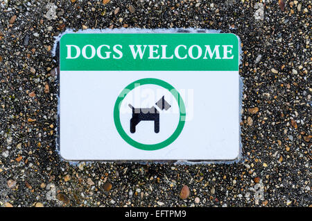 a sign saying dogs welcome Essex UK Stock Photo