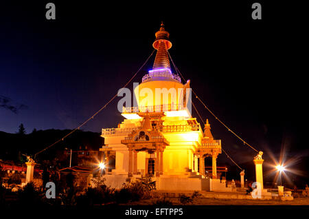 BU00079-00...BHUTAN - The National Memorial Chorten in the town of Thimphu is lit up at night. Stock Photo