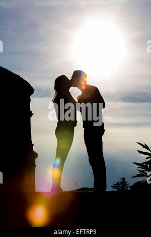 Couple silhouette. Roman Colosseum. Rome, Italy Stock Photo