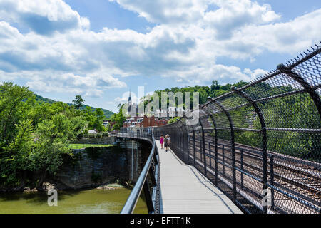 Appalachian Trail footbridge over Potomac River at Harpers Ferry National Historic Park looking towards town, West Virginia, USA Stock Photo