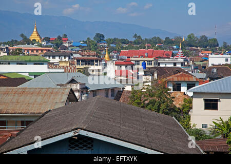 View over rooftops, Buddhist temples and stupas in the town Keng Tung / Kengtung, Shan State, Myanmar / Burma Stock Photo