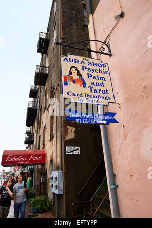 A sign for 'The Aura Shop', psychic, palm and tarot card readings by Sylvia in Savannah Georgia Stock Photo