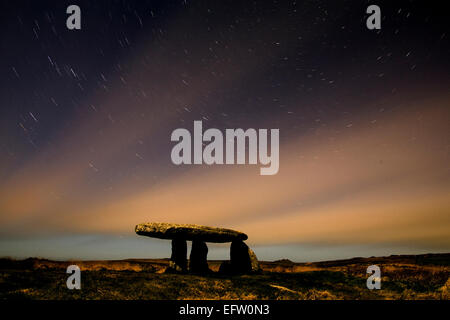 Lanyon Quoit at night. This ancient exposed burial chamber was photographed using a long exposure and natural light just a coupl Stock Photo