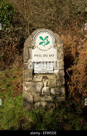 National Trust appeal sign on the South Wales Coast Path at Pwlldu Bay, Gower. Stock Photo