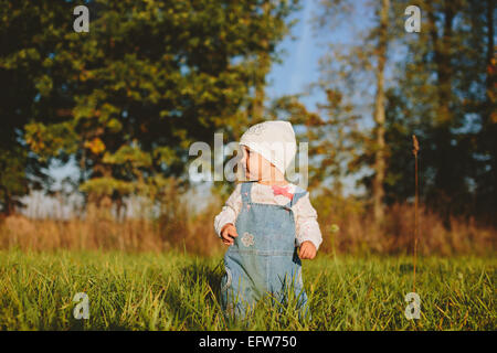 Baby walks in the park Stock Photo